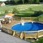 above ground pool deck ideas above ground pool designs with wood railing and table sets VJBPYRP