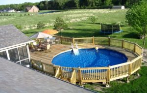 above ground pool deck ideas above ground pool designs with wood railing and table sets VJBPYRP