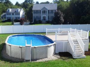 above ground pool deck ideas with pebble stone around pool also vinyl  lattice deck YZMLSYW