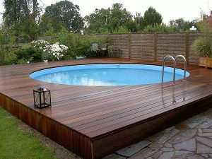 above ground pool with deck modern above ground pool decks ideas wooden deck round pool lawn stone slabs LXZLKOD