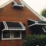 aluminum awnings one awning can be used to cover two windows like in this particular home. EYSYAJD