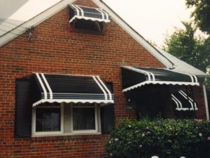 aluminum awnings one awning can be used to cover two windows like in this particular home. EYSYAJD