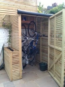 bike storage shed taller, narrower shed to store bikes upright - takes up less room in the HCJITYS