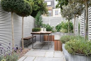 small garden design small patio garden with wooden bench SBLBARF