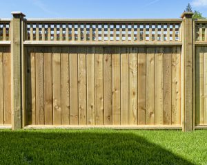 we love beautiful cedar fence designs. this one mixed with panels and  lattice work is FHJZIQQ