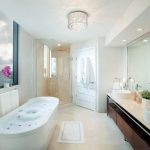 bathroom ceiling lights contemporary bathroom idea in miami with a freestanding tub and a vessel KZHMTME