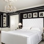 black and white bedroom example of a classic bedroom design in minneapolis with black walls,  carpet, YLZJFWF
