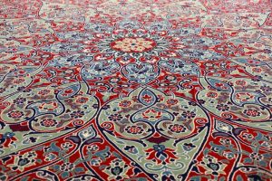 handmade carpets handmade carpet at the grand bazaar in istanbul, turkey | stock photo | VZHDEDG