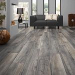 laminate floors minimalist-grey-laminate-flooring-seating-area DONOMRX