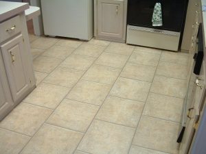 laminate tile flooring quick step laminate tile will be installed in this kitchen. this is the PLTFJET