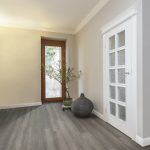 Solid stone floors tuscany - corridor and huge glass door stone grey strand woven bamboo SBIEAZP
