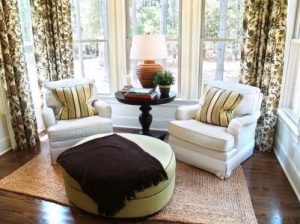 I really like this pair of chairs in front of the windows, angled