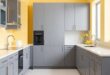 Brighten Your Home: The Perfect Harmony of Yellow Kitchens with Sleek Gray Cabinets