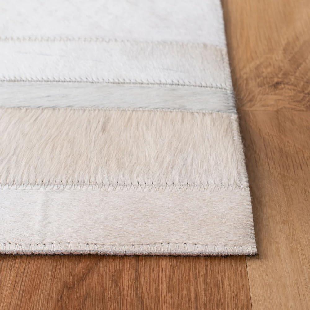 Our Take on ELYSSIA's Artisan White Stripes ​Leather Rug