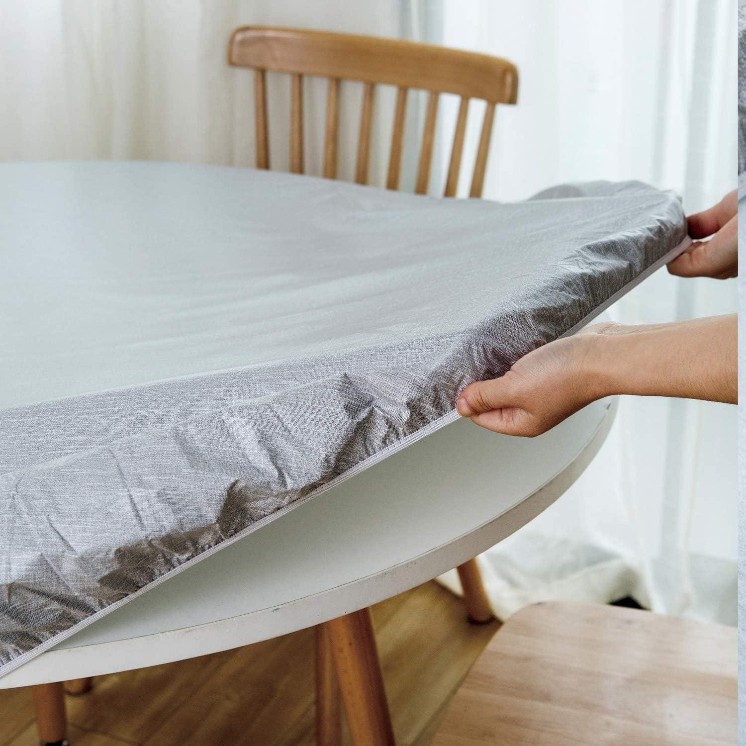 How We Loved the Wood Panel Round Table Cloth for Our 44