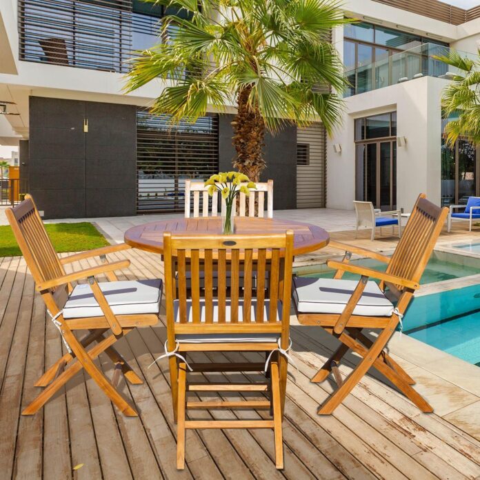 Gathering Around The Stylish Teak Las Palmas Patio Set
