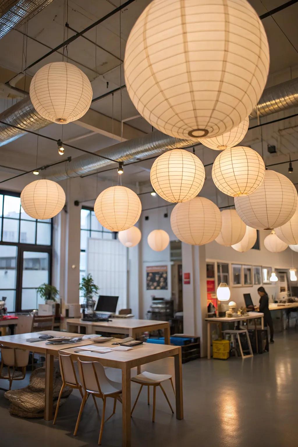 Paper lanterns create a playful and whimsical feel in this creative studio.