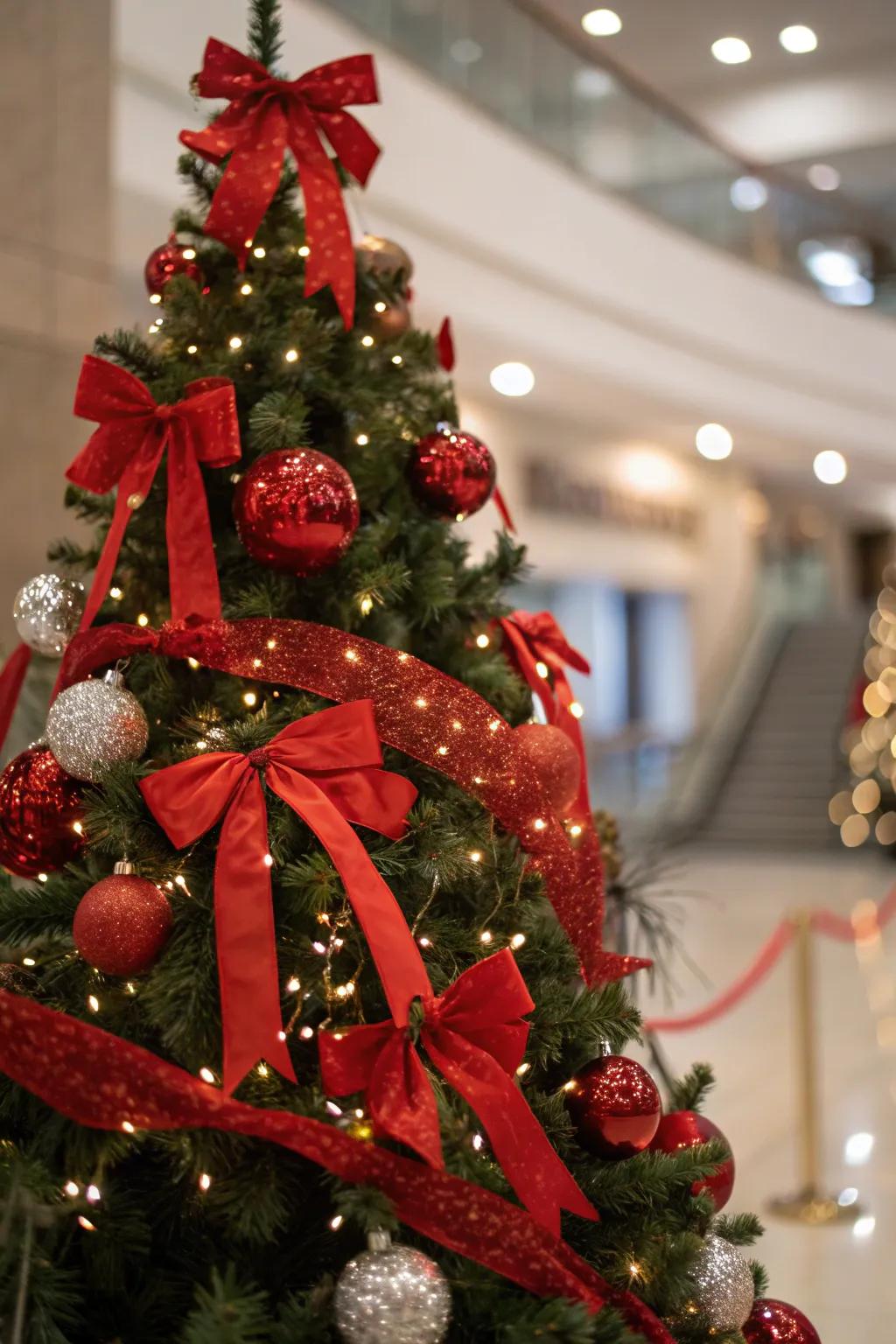 Red ribbons and bows add a charming touch to the tree.