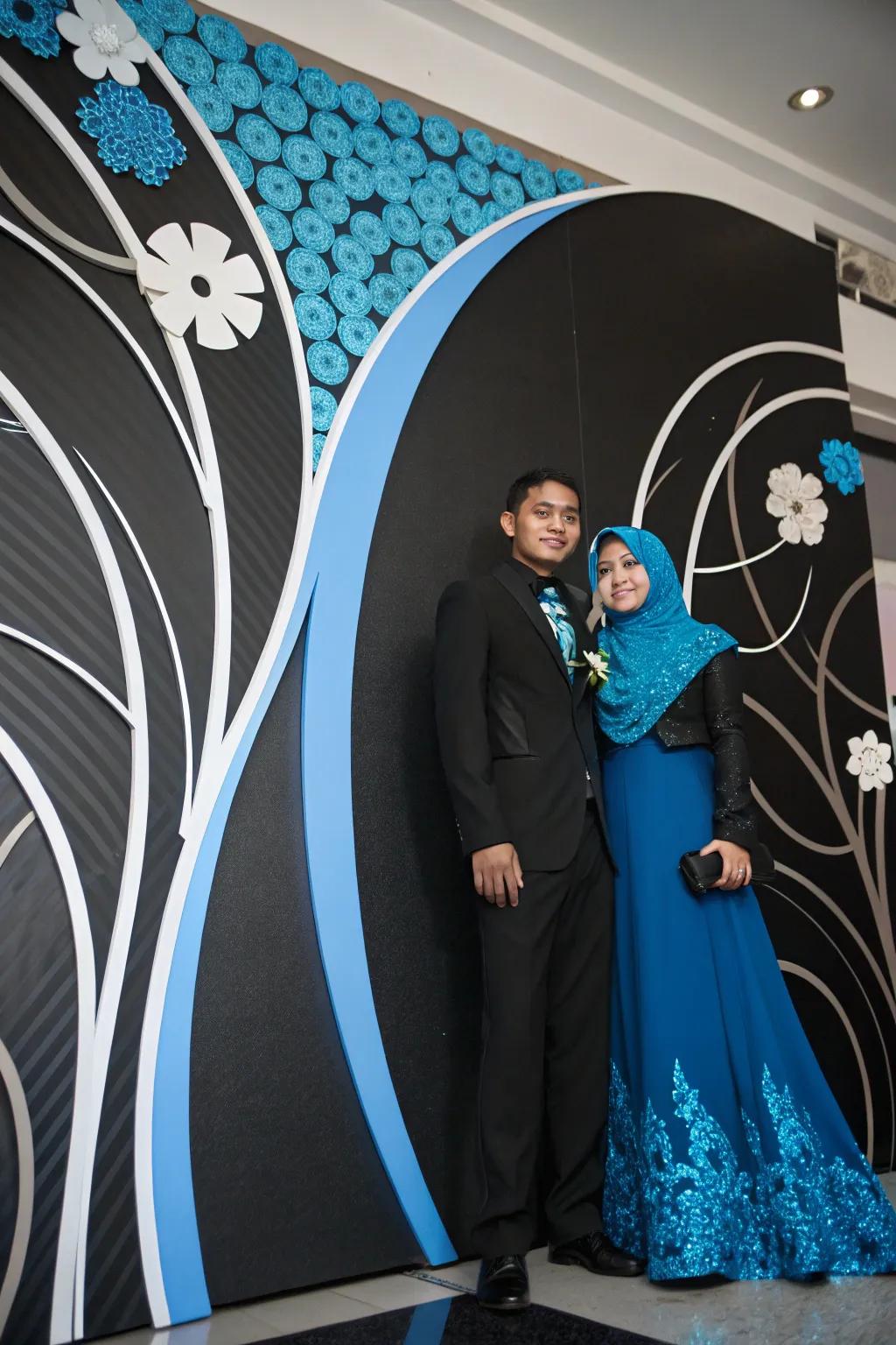 Creative photo backdrop in black and blue for guest snapshots.
