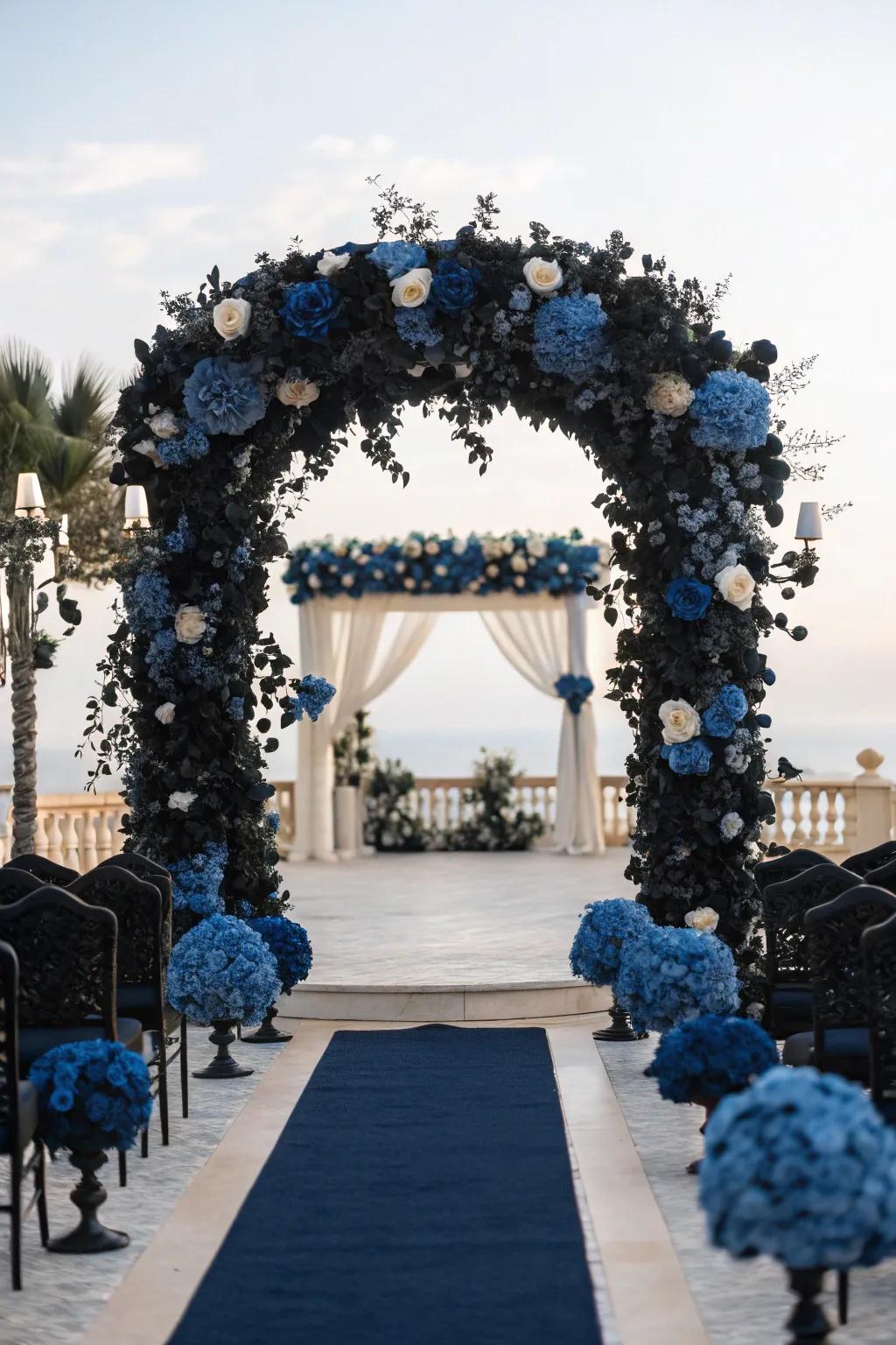 Ceremony space decorated with black and blue accents.