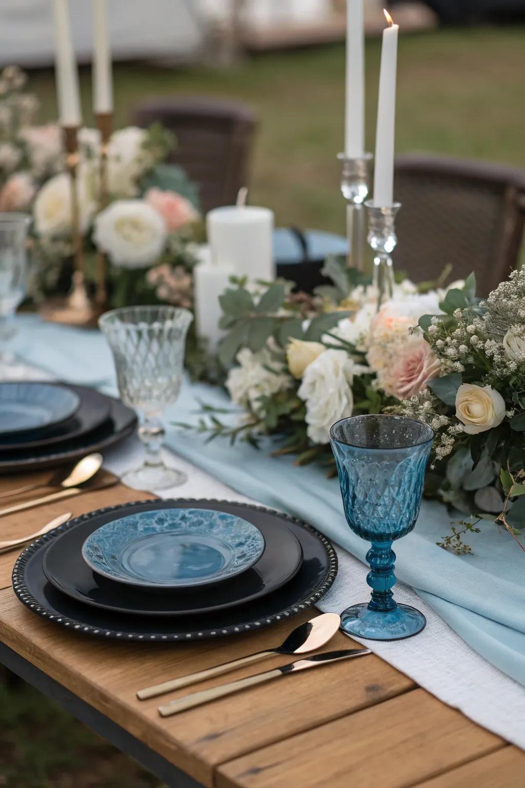 Sophisticated black and blue table settings for a refined celebration.