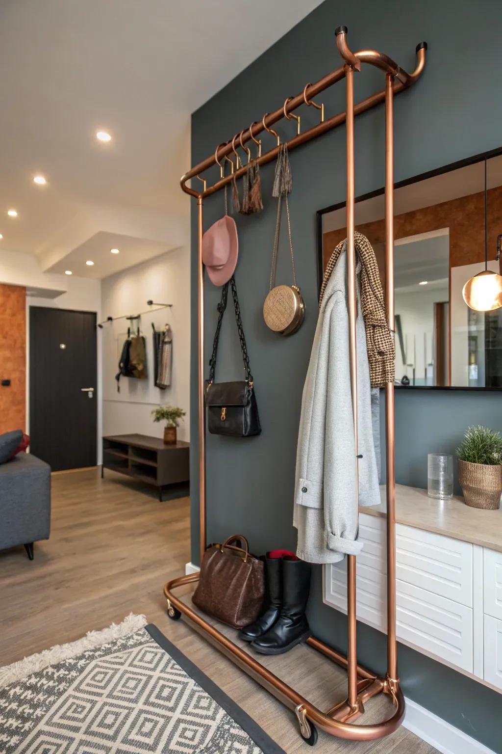 Stylish DIY coat rack made from metal pipes adding a warm industrial touch.